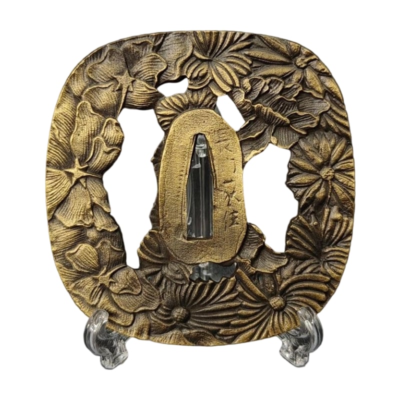 Tsuba with Floral Design, Alloy, Modern Piece. Tsuba, Sword Guard, Japanese Sword Fittings.: Tsuba with Floral Design, Alloy, Modern Piece Material: Alloy. Weight: Approximately 139 grams. Thickness: Approximately 5 millimeters. The item is only the tsuba; the sword stand is used for photogra