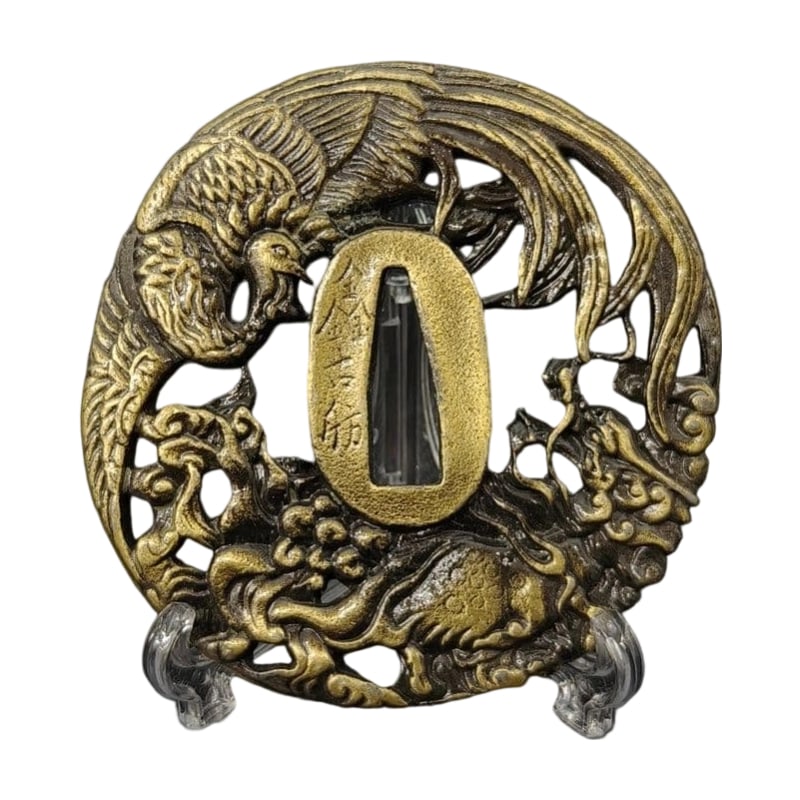 Tsuba with Design of Kirin and Phoenix Alloy Modern Piece Tsuba Sword Guard Japanese Sword: Tsuba with Design of Kirin and Phoenix, Alloy, Modern Piece Material: Alloy. Weight: Approximately 137 grams. Thickness: Approximately 5 millimeters. The item is only the tsuba; the sword stand is use