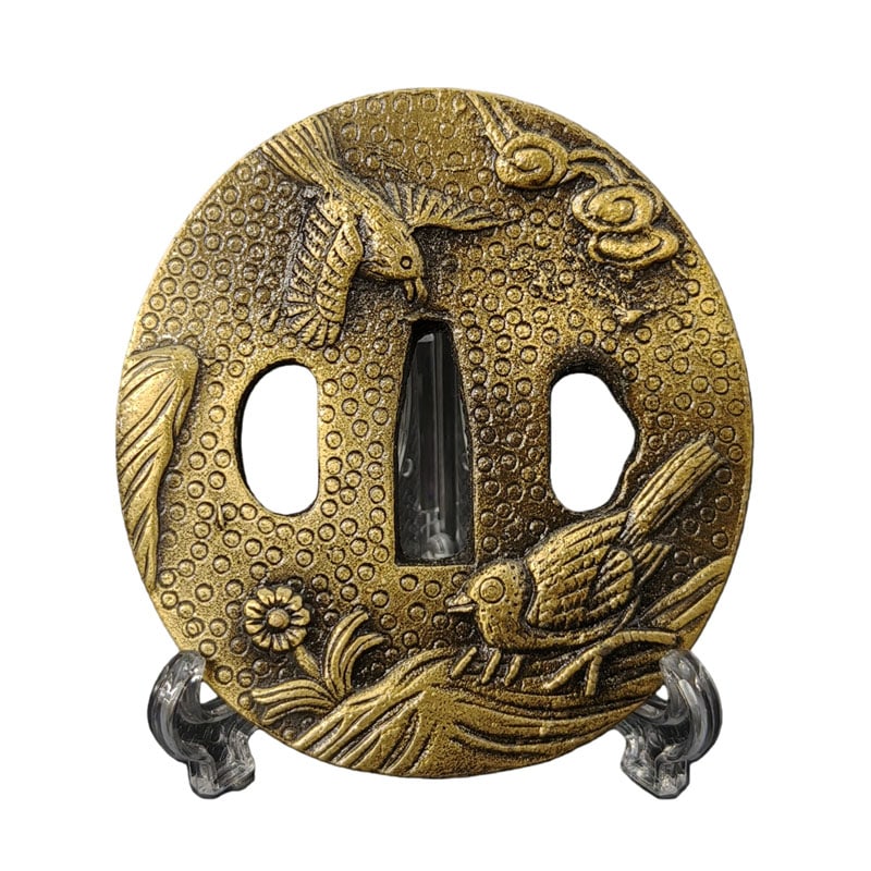 Tsuba with Bird Motif, Alloy, Fine Workmanship: Tsuba with Bird Motif, Alloy Craftsmanship Material: Alloy. Thickness: Approximately 5 millimeters. Weight: Approximately 138 grams. The item is solely the tsuba and does not include a tsuba stand. Th