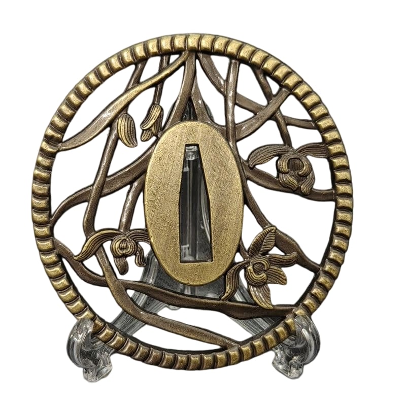 Tsuba with Orchid Design, Alloy, Modern Work, Fuchi, Japanese Sword Fittings.: Tsuba with Orchid Design, Alloy, Modern Piece, Fittings for Japanese Sword Material: Alloy. Weight: Approximately 74 grams. Thickness: Approximately 5 millimeters. The item is only the tsuba; the swor