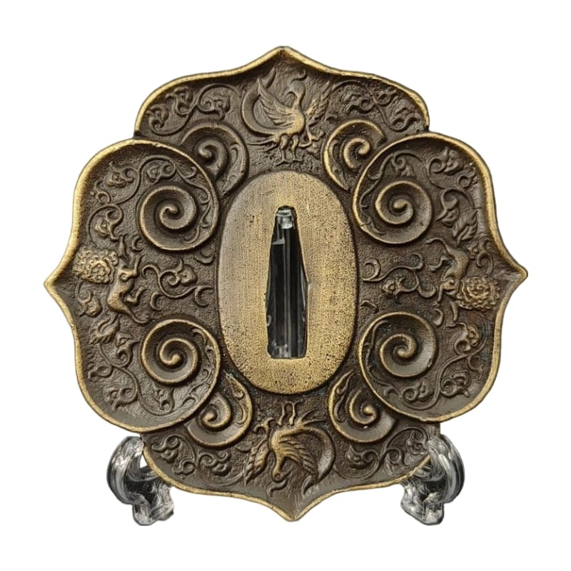 Tsuba with Cloud and Arabesque Pattern, Alloy, Modern Piece. Tsuba, Sword Guard, Japanese Sword: Tsuba with Cloud Pattern and Arabesque Design, Alloy, Modern Piece Material: Alloy. Weight: Approximately 112 grams. Thickness: Approximately 5 millimeters. The item is only the tsuba; the sword stand