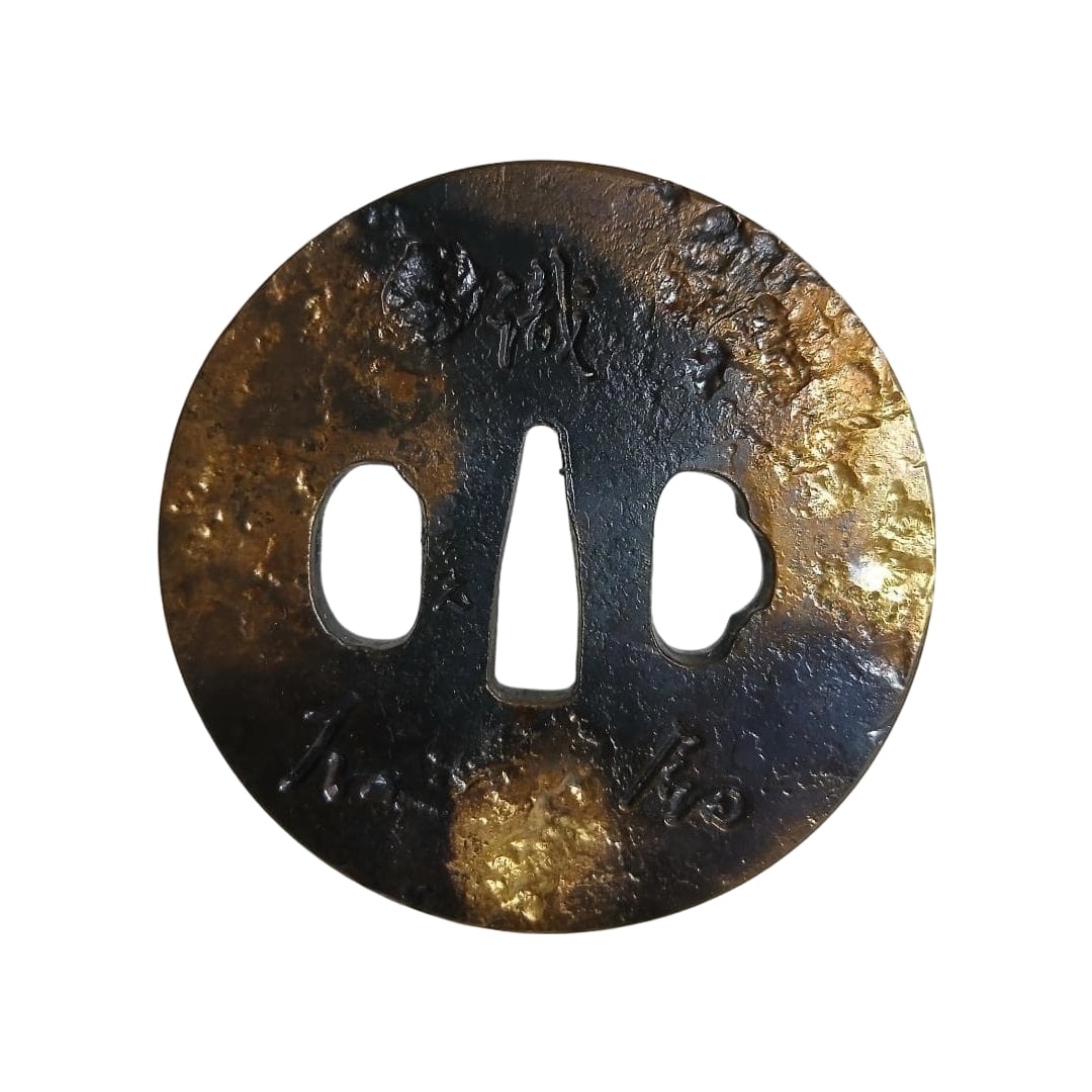 Armor Tsuba by Unshu Koko: Armor Tsuba by Unshu Hiroko. Armor Tsuba by Unshu Hiroko. Dimensions: Height 12 cm x Width 12 cm x Depth 2.5 cm. Unshu Hiroko was a blacksmith from the Izumo region during the Edo period (Tenpo era, 1