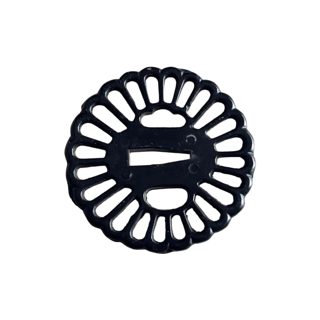 Black Petal-Shaped Tsuba: Black Petal-Shaped Tsuba A black petal-shaped tsuba (handguard), characterized by its black color and petal-like shape, suitable for the adornment of weaponry.
