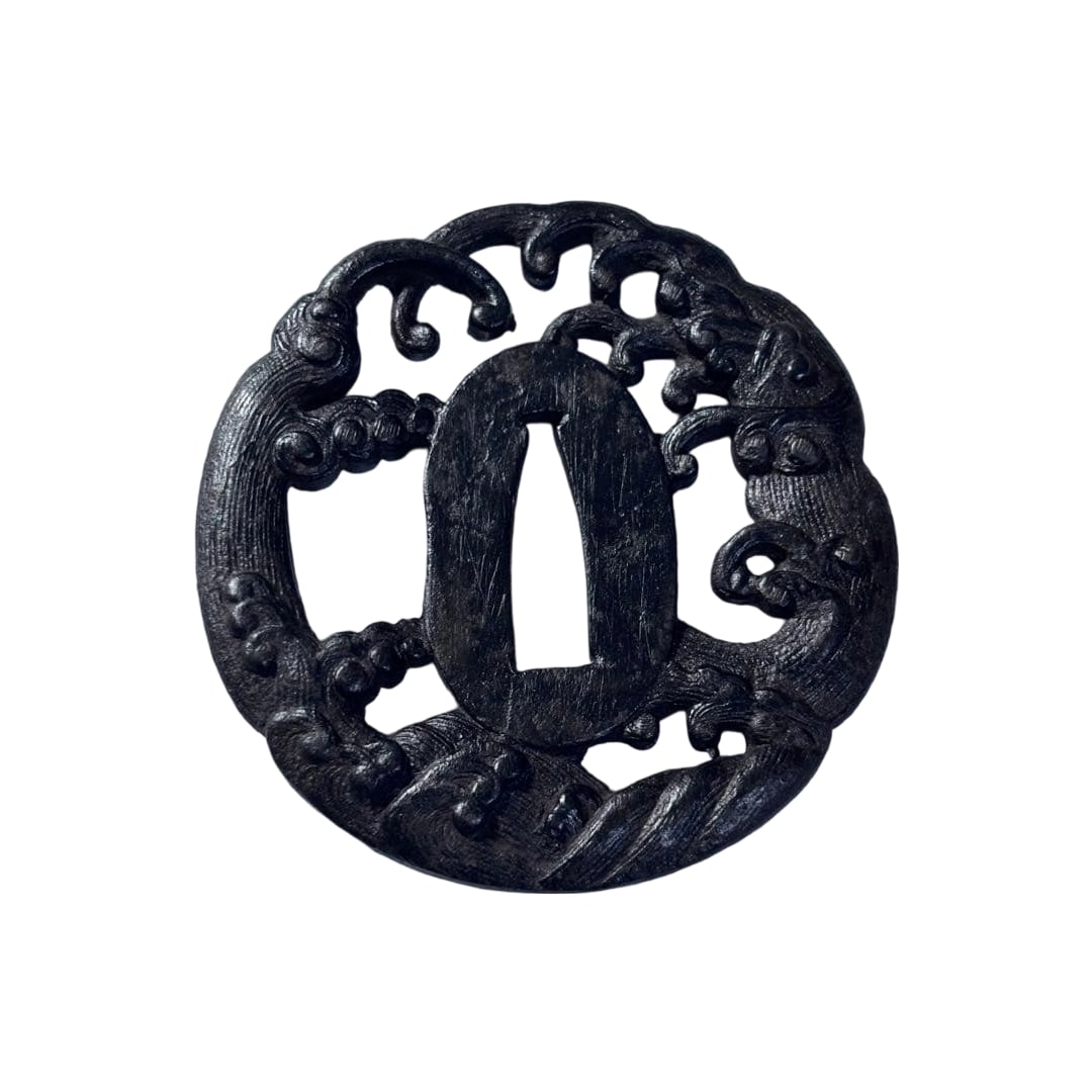 Iron ground with wave pattern openwork sword fittings, Japanese sword, arms and armor, antique.: This is a Japanese sword fitting, classified as a tsuba, made of iron. The design features an openwork wave pattern. It utilizes the unique heavy texture of iron and is adorned with a dynamic wave pat