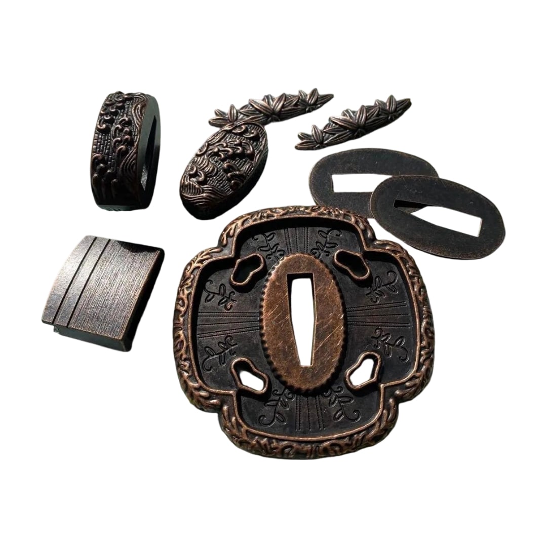 A complete set of sword fittings: carved habaki, scabbard ring, seppa, menuki, fuchi, koshirae set.: A complete set of sword fittings, including carved habaki, scabbard ring, seppa, menuki, fuchi, and kashira mountings. Dark bronze habaki and koshirae set, made of alloy. Suitable for use in replica s