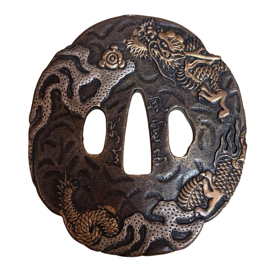Sword Fittings with Dragon Motif, Japanese Sword: Sword Fittings: Dragon Motif Tsuba, Japanese Sword This is a circular tsuba, featuring a high-relief design of dragons and clouds, with a substantial texture. The motif is a dragon design.