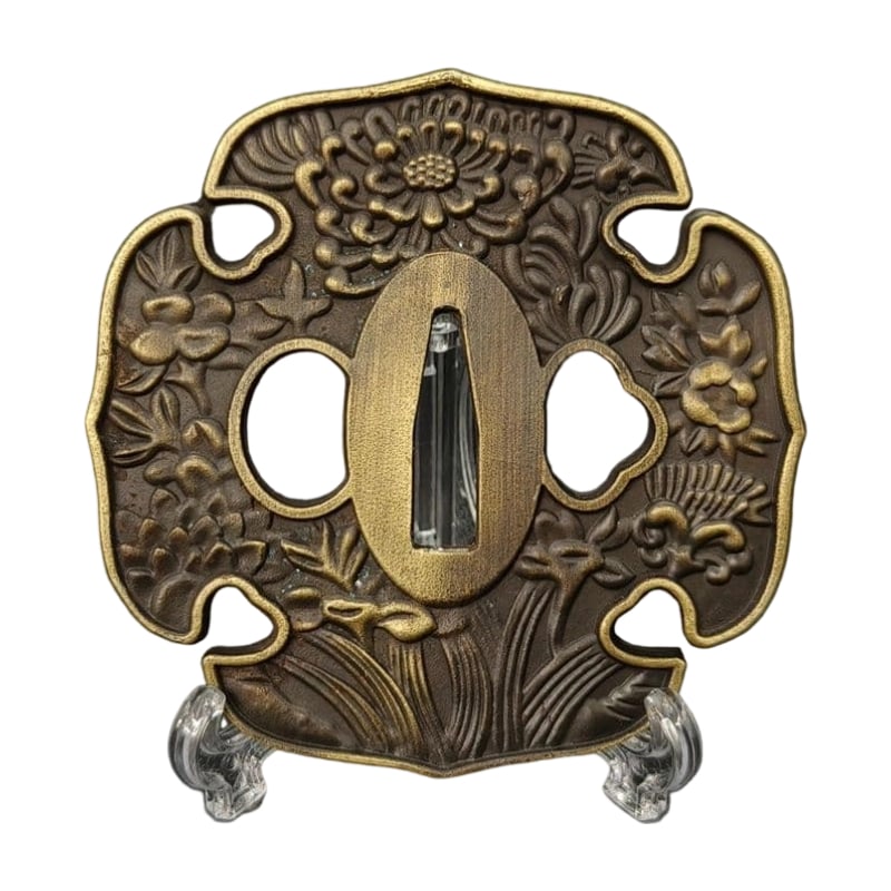 Tsuba with Chrysanthemum Design, Alloy, Modern Piece: Tsuba with Chrysanthemum Design, Alloy, Modern Piece Material: Alloy. Weight: Approximately 100 grams. Thickness: Approximately 4.6 millimeters. The item is only the tsuba; the sword stand is for