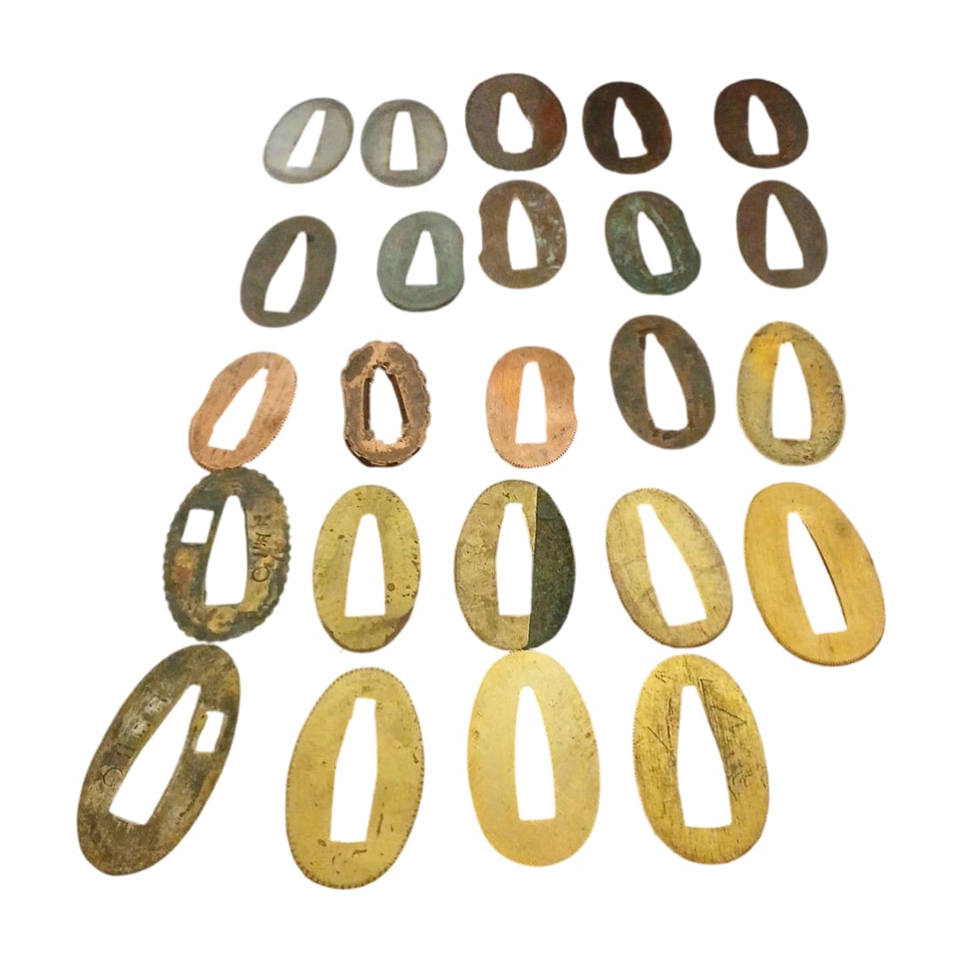 Japanese Sword Fittings: Habaki, Set of 24 Pieces: Japanese Sword Fittings: Habaki Set of 24 This is a bulk sale of Japanese sword fittings Habaki (sword collar) set of 20 pieces. It includes various types of different materials and shapes, suitable