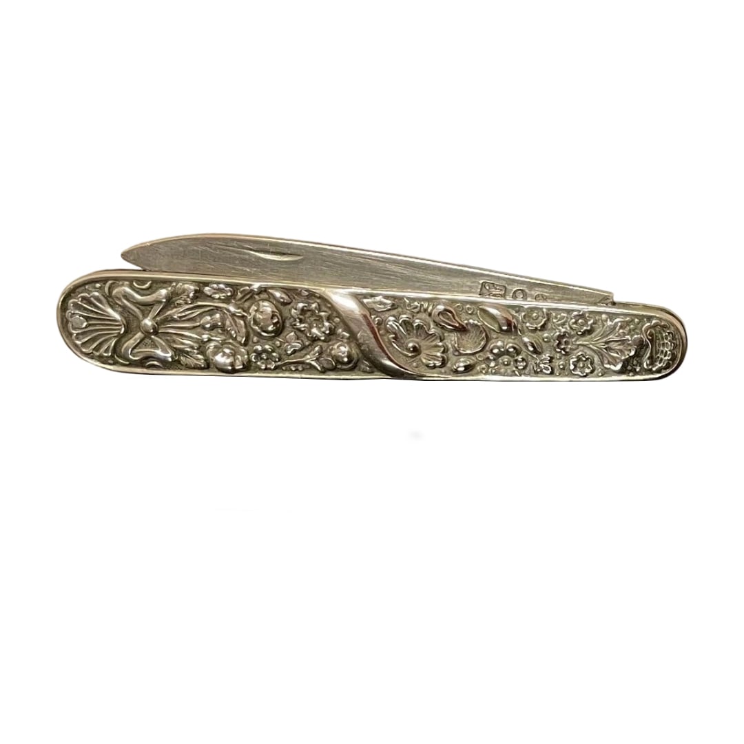 Victorian Era Antique Silver Fruit Knife with Markings: Victorian Era circa 1880-1910 Antique English Silver Fruit Knife, with Marks. Both sides of the handle are adorned with beautiful floral and leaf designs. The single-edged blade bears three visible ma