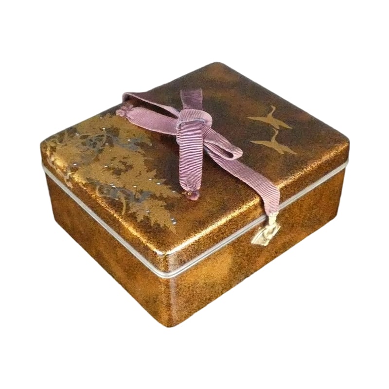 Antique: Full Nashiji Lacquer Silver Dew Pattern Fern and Crane Maki-e Writing Box with Tin Edging: Antique Full Nashiji Lacquer Box with Silver Dew Pattern, Ferns, and Cranes Maki-e. Tin Edging with Carved Gilt Fittings. The lacquer surface exhibits minor dents and cracks. The cord shows signs of d