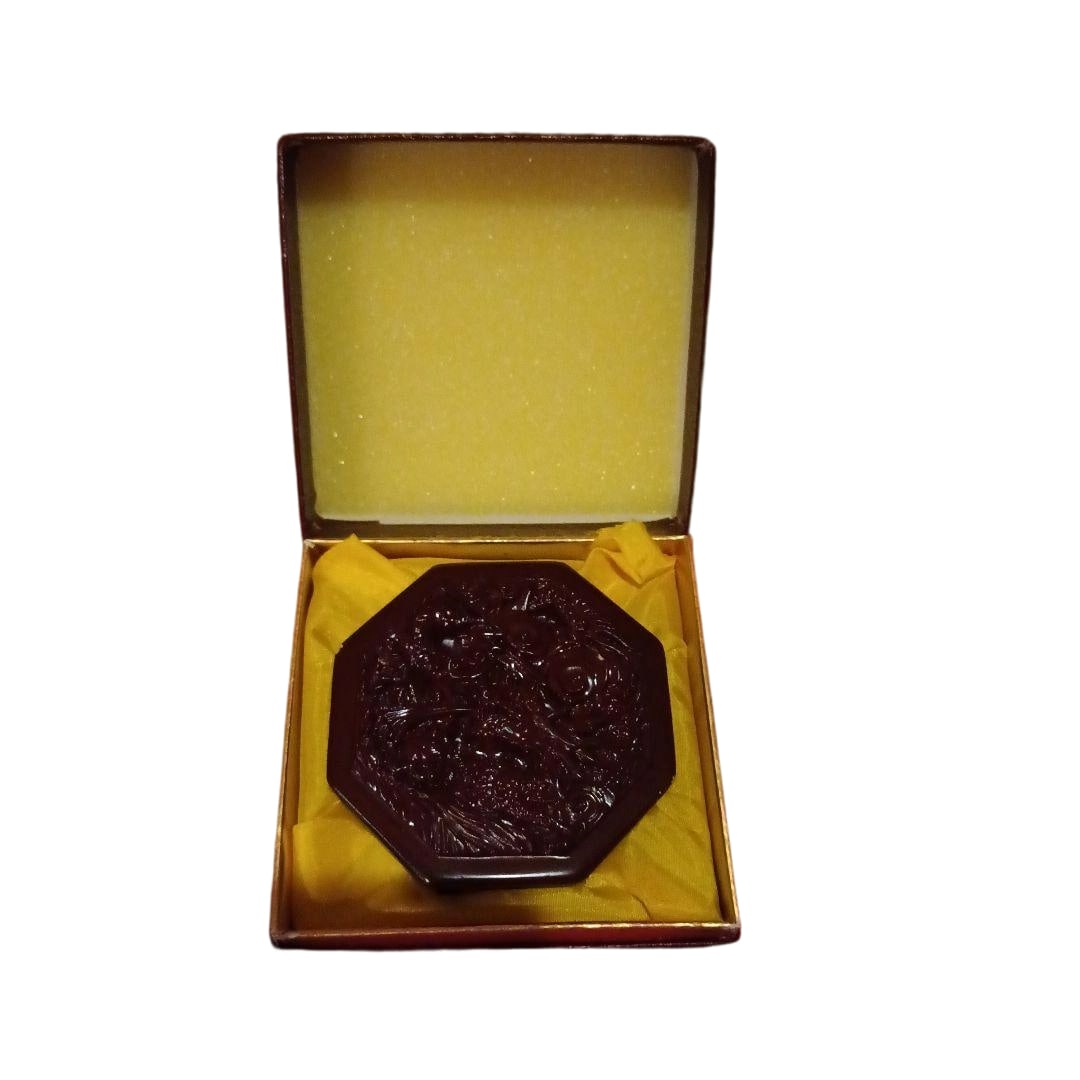 A high-grade octagonal inro with accompanying red ink paste. (1 of 7)