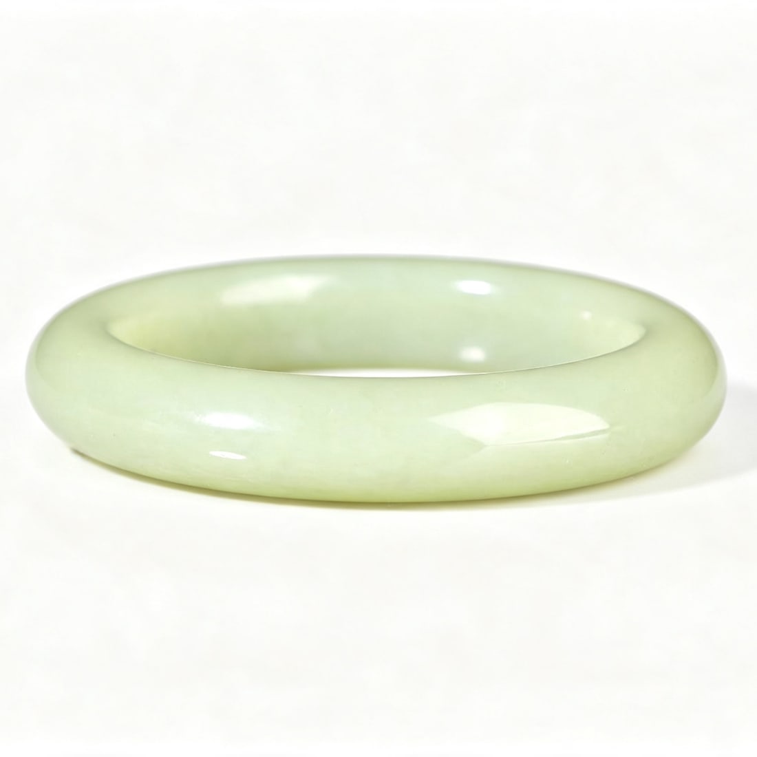 Hetian Jade Yellow Jade Bracelet: This Hetian jade yellow jade bracelet features a delicate and smooth oily jade quality, showcasing a unique warm luster that adds to its collectible value. The inner diameter is designed for comfort, 
