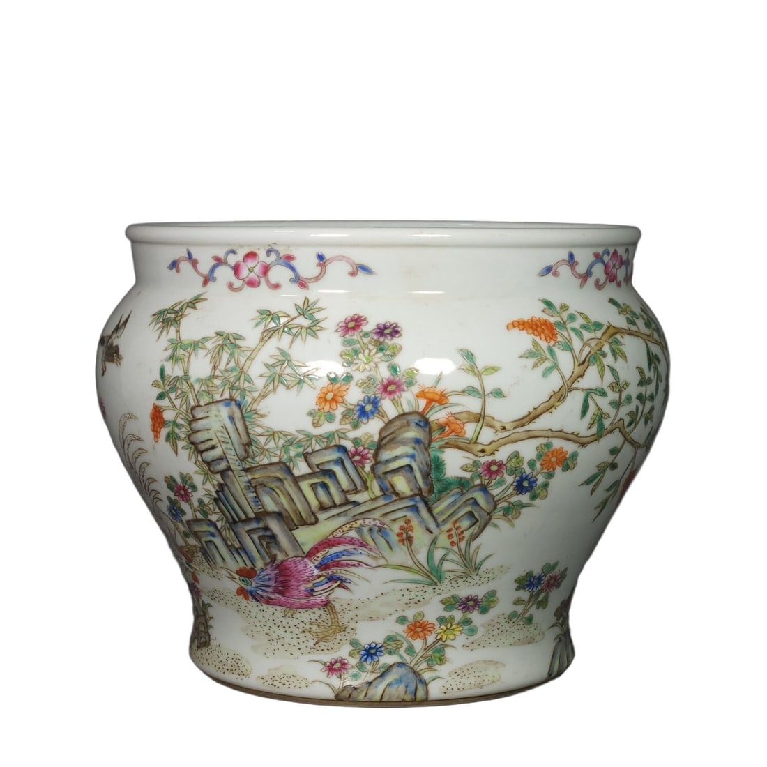Qing Dynasty Famille Rose Flower and Bird Footed Vase: This vase is made during the Qing Dynasty, specifically in the Qianlong period. The exquisite famille rose technique showcases vivid flower and bird motifs, reflecting the artistic style and craftsman