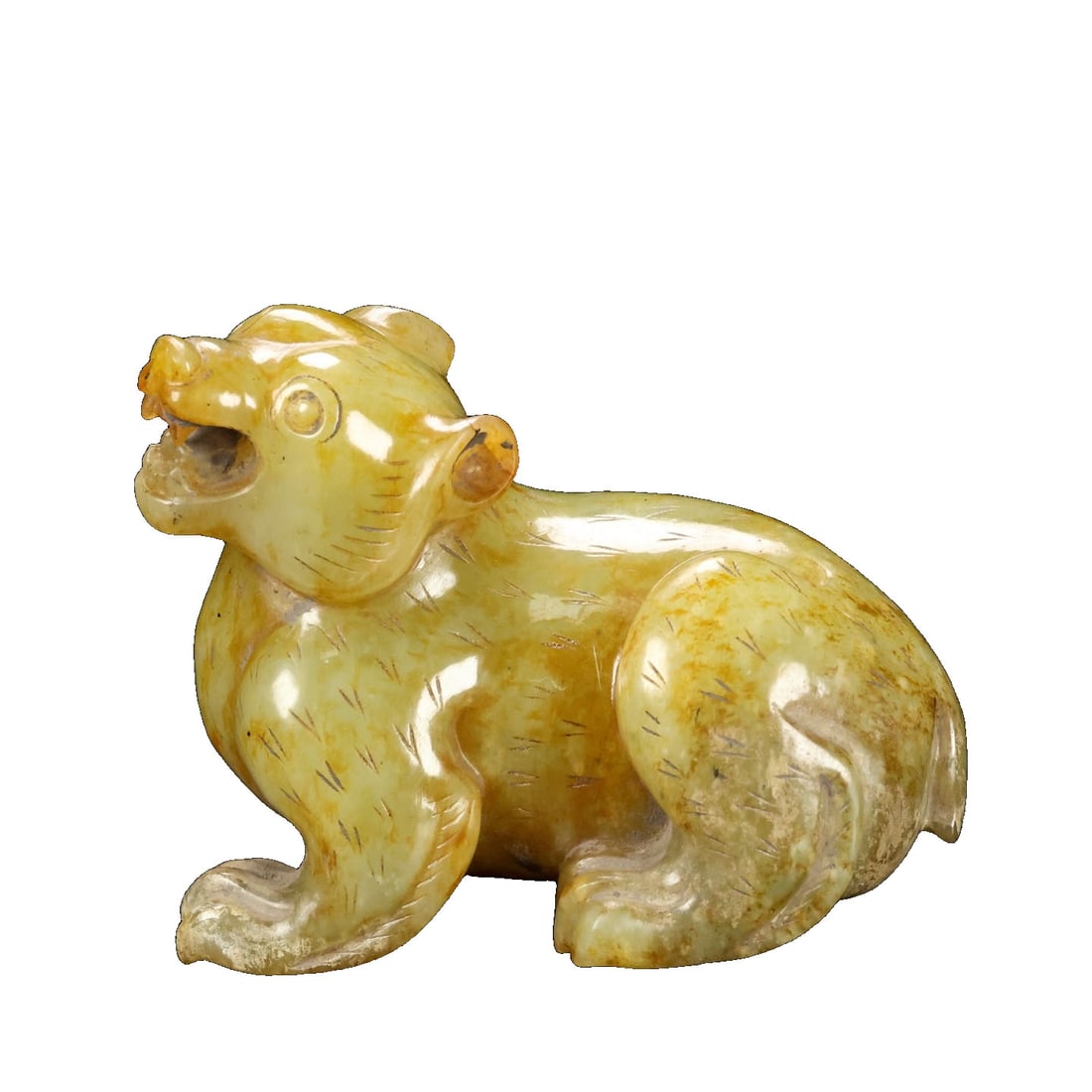 He Tian Jade Carving of Dominance: This piece of He Tian jade carving is renowned for its exquisite craftsmanship and perfect condition. The natural soil color penetrates deeply, with a thick and ancient patina, and the jade quality