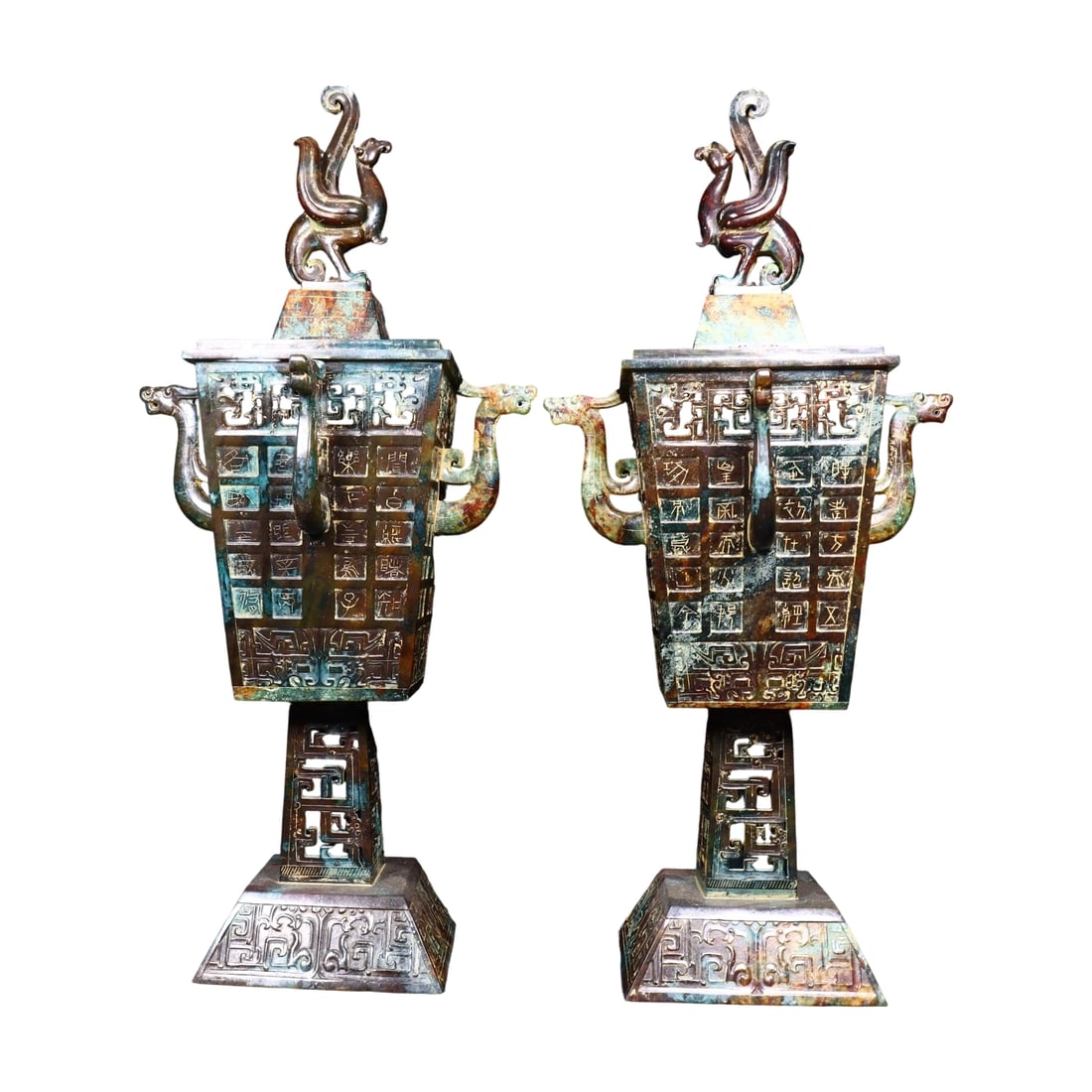 Pair of Hetian Jade Incense Burners: This pair of Hetian jade incense burners features a rich patina, showcasing exquisite craftsmanship. The detailed work highlights the warm texture of the jade. (Length 26cm, Width 26cm, Height 56cm,