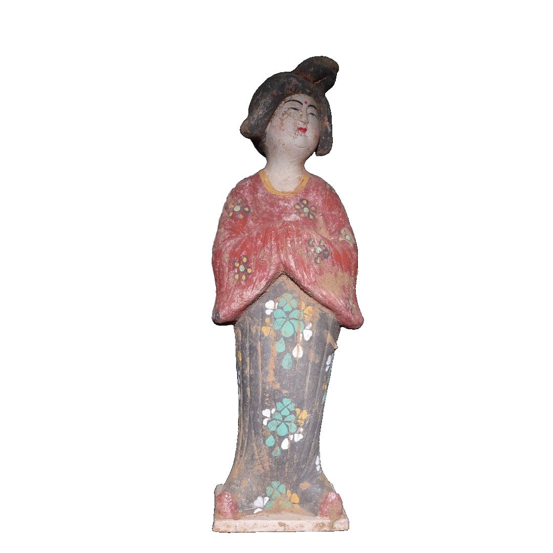 Tang Dynasty Painted Pottery Figurine: This Tang Dynasty painted pottery figurine is exquisitely crafted with vivid expressions, showcasing the superb craftsmanship of the Tang era. Its vibrant colors and well-preserved condition make it