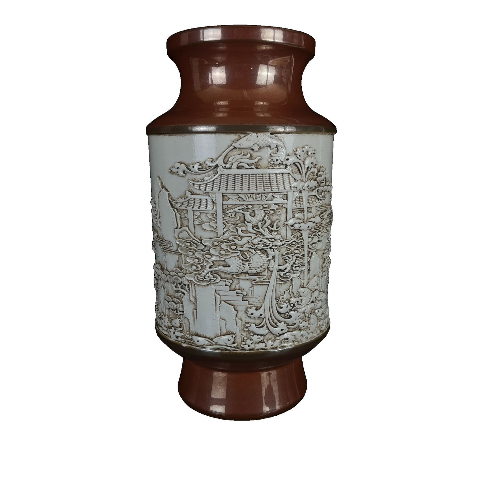 White Porcelain Carved Carp Leaping Dragon Gate Mallet Vase: This piece is meticulously carved by master Wang Bingrong, with fine white porcelain and exquisite craftsmanship. The theme of carp leaping over the dragon gate symbolizes good fortune and striving fo
