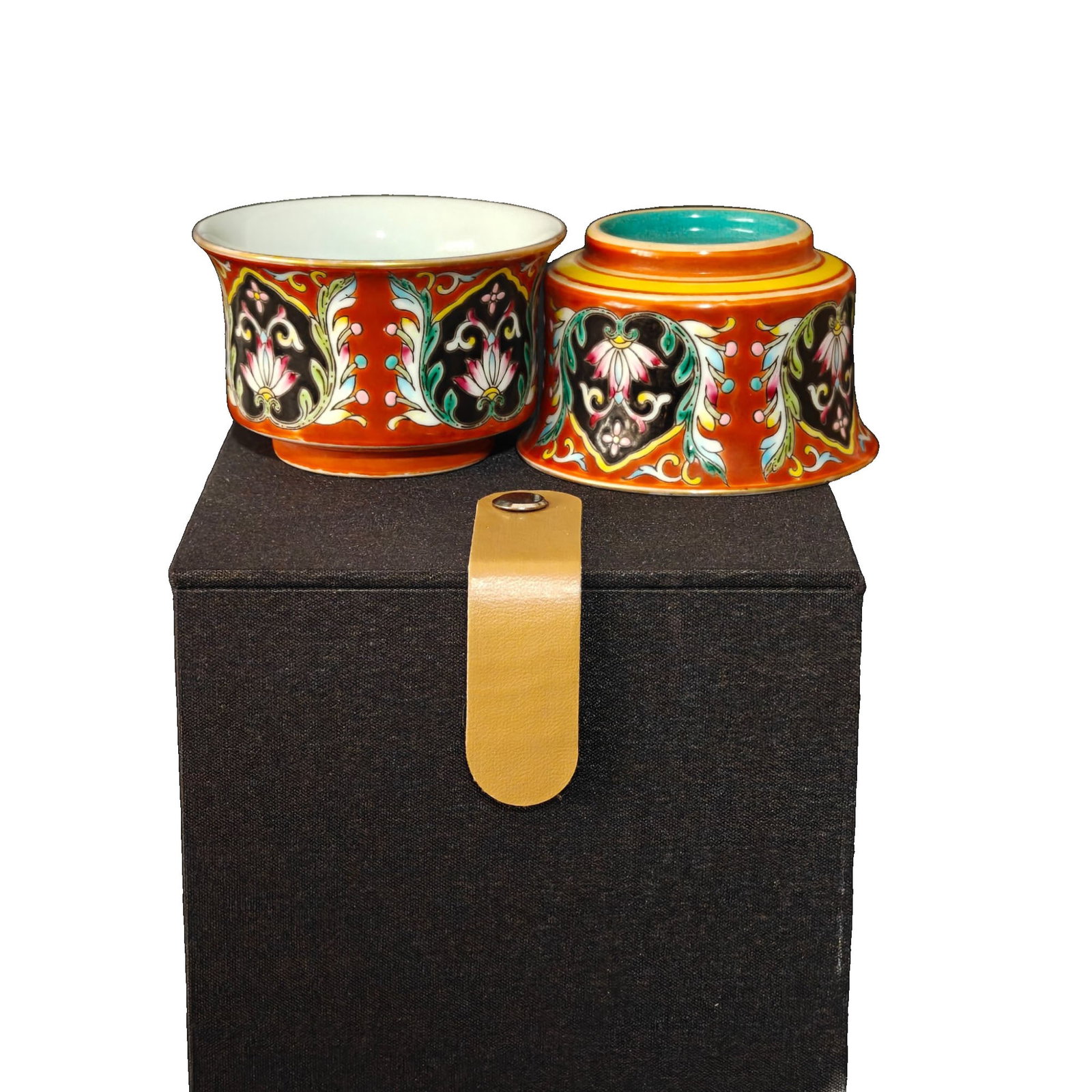 Yongzheng Imperial Enamel Cup: This pair of enamel cups showcases the exquisite craftsmanship of the Yongzheng period imperial production, with vibrant colors and intricate patterns, offering high collectible value. The shape is