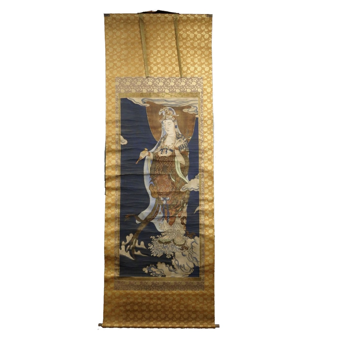A Hanging Scroll of the Bodhisattva Avalokiteshvara, the Greatly Compassionate and Merciful Savior: The painting core measures approximately 133.5cm x 59.5cm, and the frame measures approximately 230cm x 81.5cm. The surface of the painting has stains and creases.