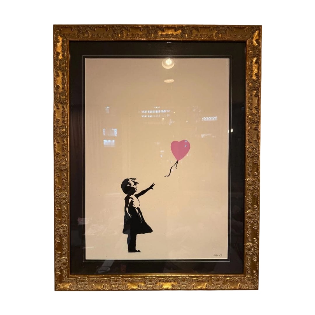 Banksy "Girl with a Pink Balloon" WCP with COA: This is a work by Banksy titled "Girl with Pink Balloon," a reproduction by WCP company, edition 142/150, with paper dimensions approximately 500mm x 700mm. This WCP is a special edition, accompanied 