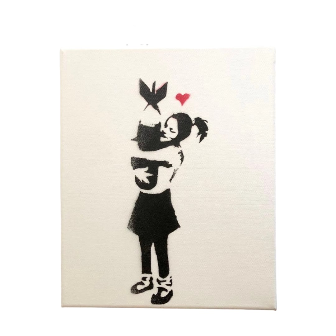 Banksy "Bomb Hugger" Signed with Documentation: Banksy Bomb Hugger Signed with Documentation This Bomb Hugger was purchased by Banksy in 2015 at Dismaland and is a rare canvas artwork. Only 15 limited edition pieces were produced. The back of the c