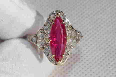 RUBY RING DIAMOND PLATINUM GOLD R2.53CT D.90CT: weight: 4.16 grams, color: red, gemstone: NATURAL HEATED RUBY 2.53ct 15.4mm x 5.5mm, size: 8, dimensions: 17.7mm x 18.5mm, metal: platinum & 14k yellow gold* some diamonds are a little loose.