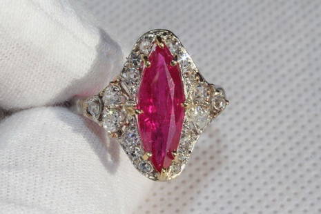RUBY RING DIAMOND PLATINUM GOLD R2.53CT D.90CT: weight: 4.16 grams, color: red, gemstone: NATURAL HEATED RUBY 2.53ct 15.4mm x 5.5mm, size: 8, dimensions: 17.7mm x 18.5mm, metal: platinum & 14k yellow gold* some diamonds are a little loose.