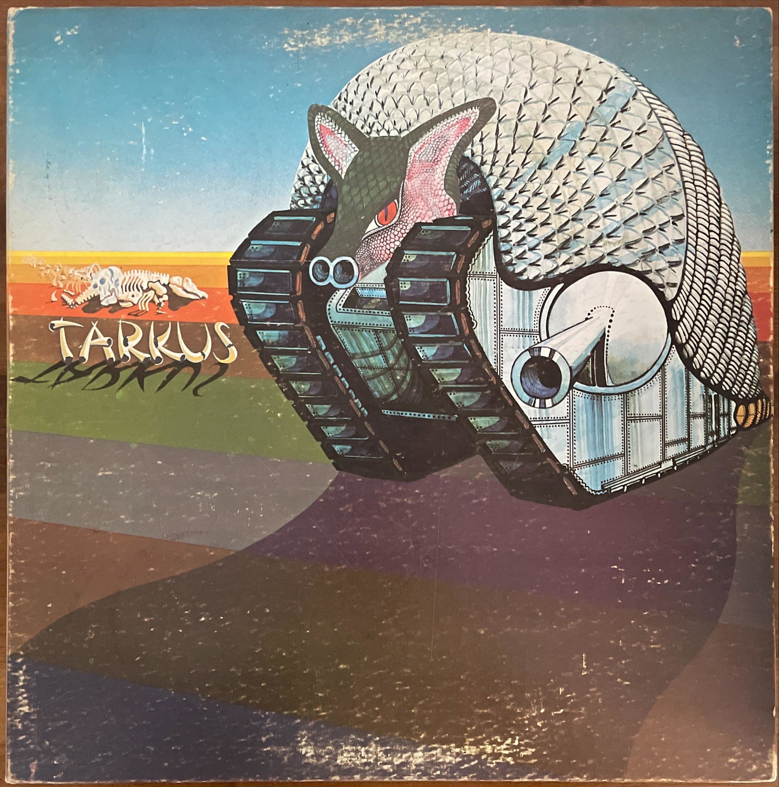 Emerson, Lake, and Palmer: Tarkus: Title: Tarkus Code: SD 9900 Label: Cotillion Year Released: 1971 Country: Canada Format: Vinyl, LP, Album, Stereo Genre: Rock Style: Prog Rock Condition: Very Good (VG) </