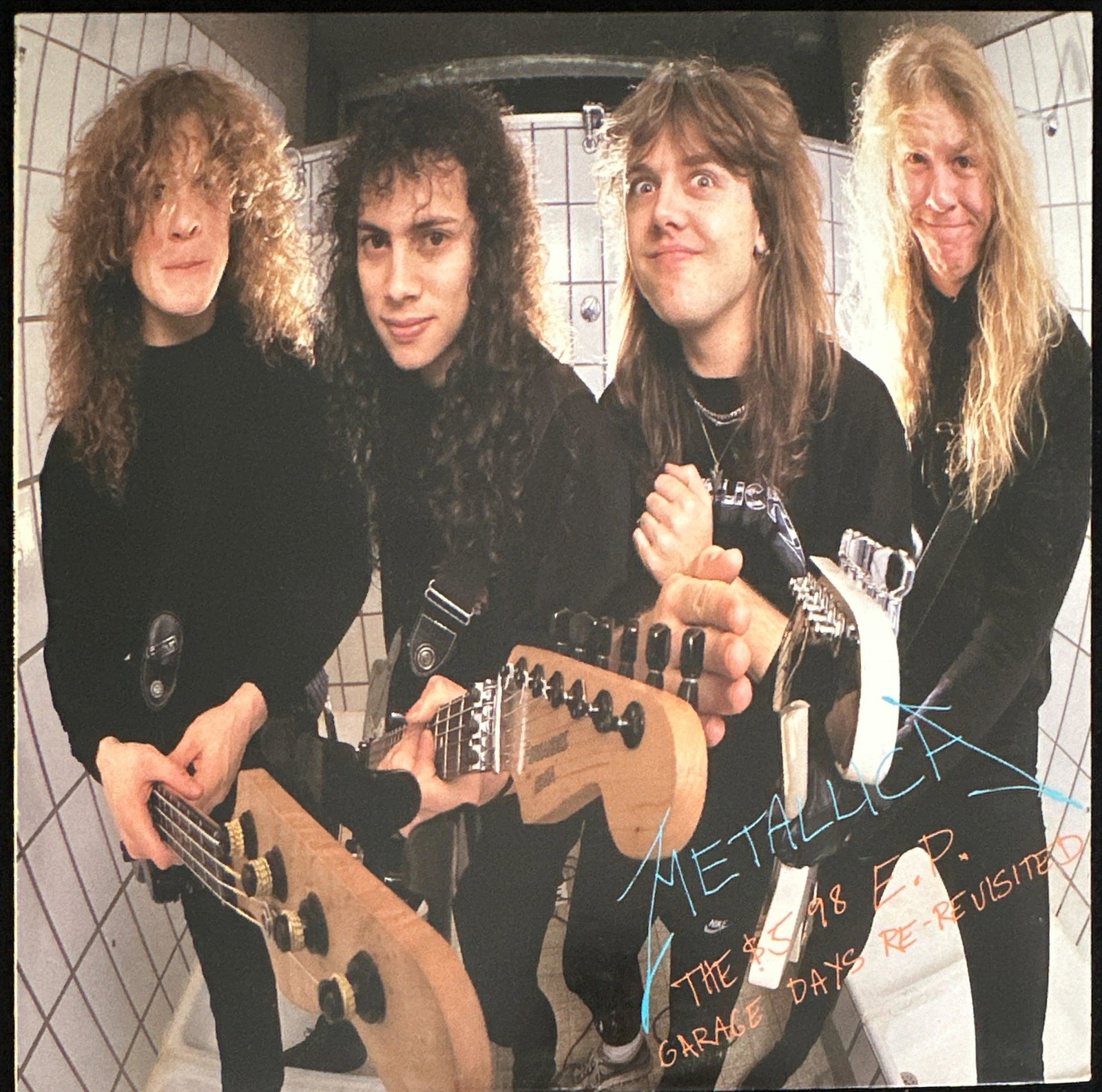 Metallica: The $5.98 E.P. Garage Days Re-Revisited (1987) First Pressing: Title: The $5.98 E.P. Garage Days Re-Revisited Artist: Metallica Label: Elektra Code: 888 788-1 Release Year: 1987 Format: Vinyl, 12", 45 RPM, EP, Stereo