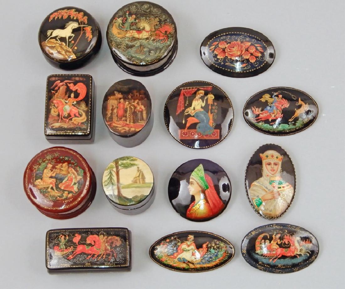 Grouping of Russian lacquer pins and boxes: Grouping of Russian lacquer pins and boxes, fourteen total, includes seven pins, and seven boxes, some signed, late 20th C.