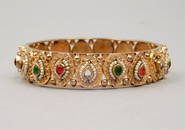 High carat gold jeweled Mogul bracelet