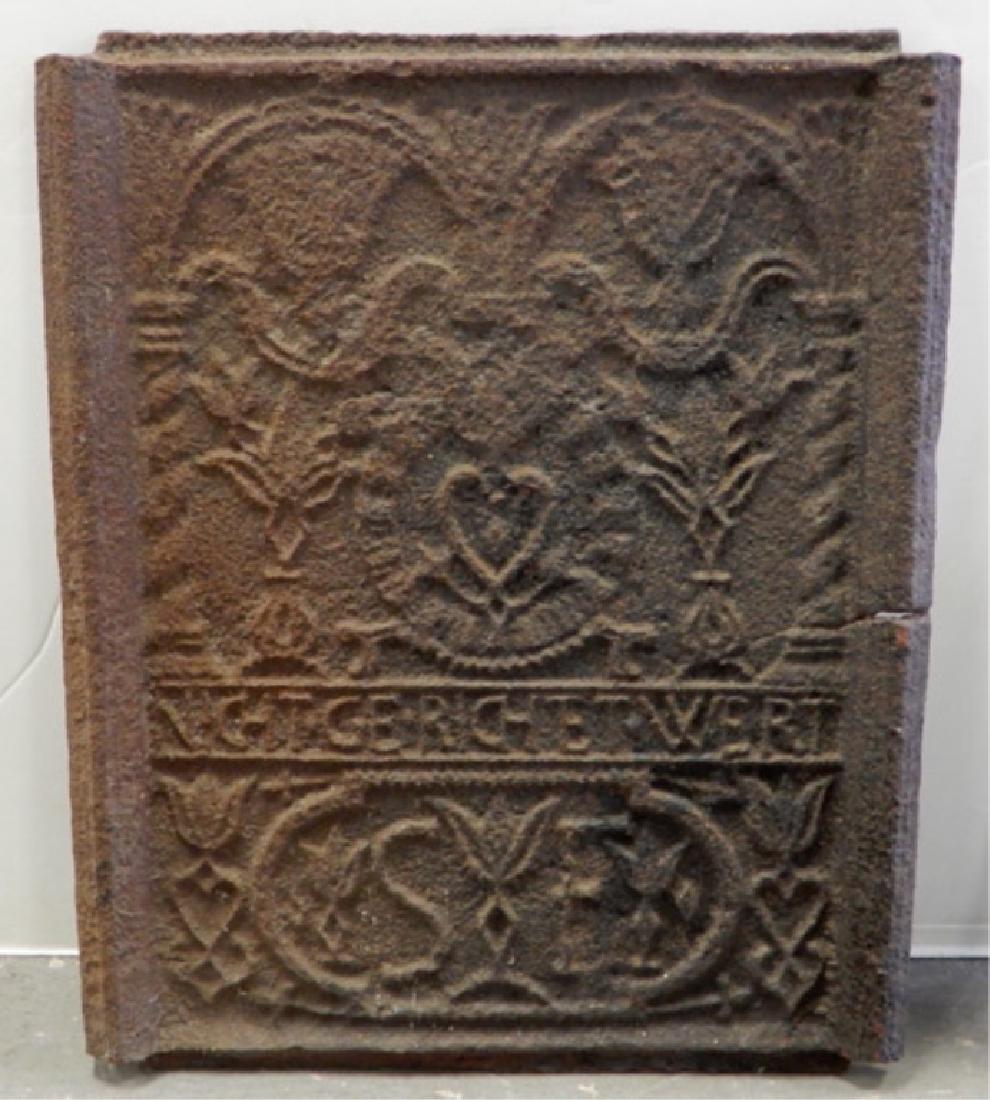 18th C. Pennsylvania German cast iron stove plate: 18th C. Pennsylvania German cast iron stove plate, heart and tulips "Judge Not of S.F.", pictured in Henry Chapman Mercer's book Bible in Iron, plate 99, 24" x 19 3/4"