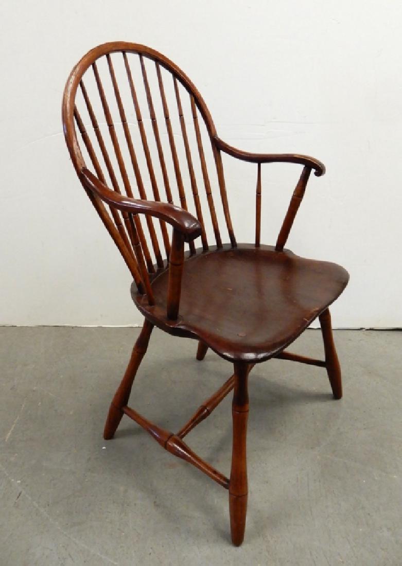 Mixed woods Windsor hoop back armchair: Mixed woods Windsor hoop back armchair, 19th C., 37" x 21" x 17"