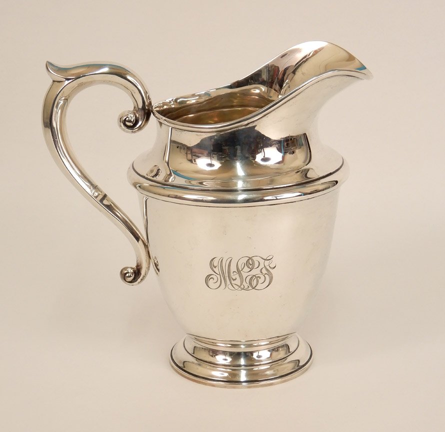 Ellmore Silver Co. sterling silver water pitcher: Ellmore Silver Co. sterling silver water pitcher, monogrammed MLT, makers mark on bottom and marked Sterling 1918, ca. 1935-60, 8 1/2" high x 8 3/4" x 6", 16.795 ozt