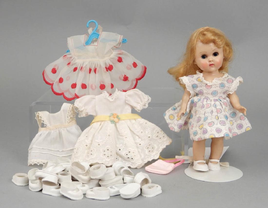 1957 Vogue Ginny 8" hard plastic walker: 1957 Vogue Ginny 8" hard plastic walker, three additional dresses, and twelve pairs of shoes