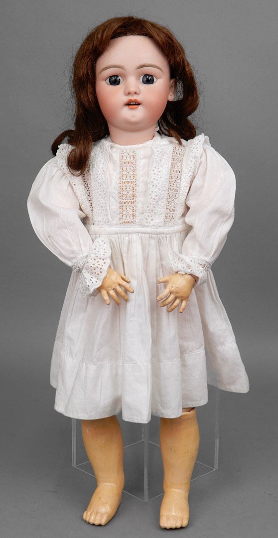 Simon & Halbig 1079 bisque head doll: Simon & Halbig 1079 bisque head doll, composition ball jointed body, blue glass sleep eyes, painted lower lashes, eyebrows, open mouth with upper teeth, pierced ears, incised on head "SH-1079-10 1/2, 