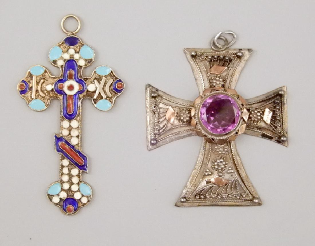 Two Eastern European silver cross pendants: Two Eastern European silver cross pendants, one enameled cross measuring 2 1/4" in length, gold wash, Russian silver mark, and one silver filigree with applied rose gold accents and 10mm synthetic ale