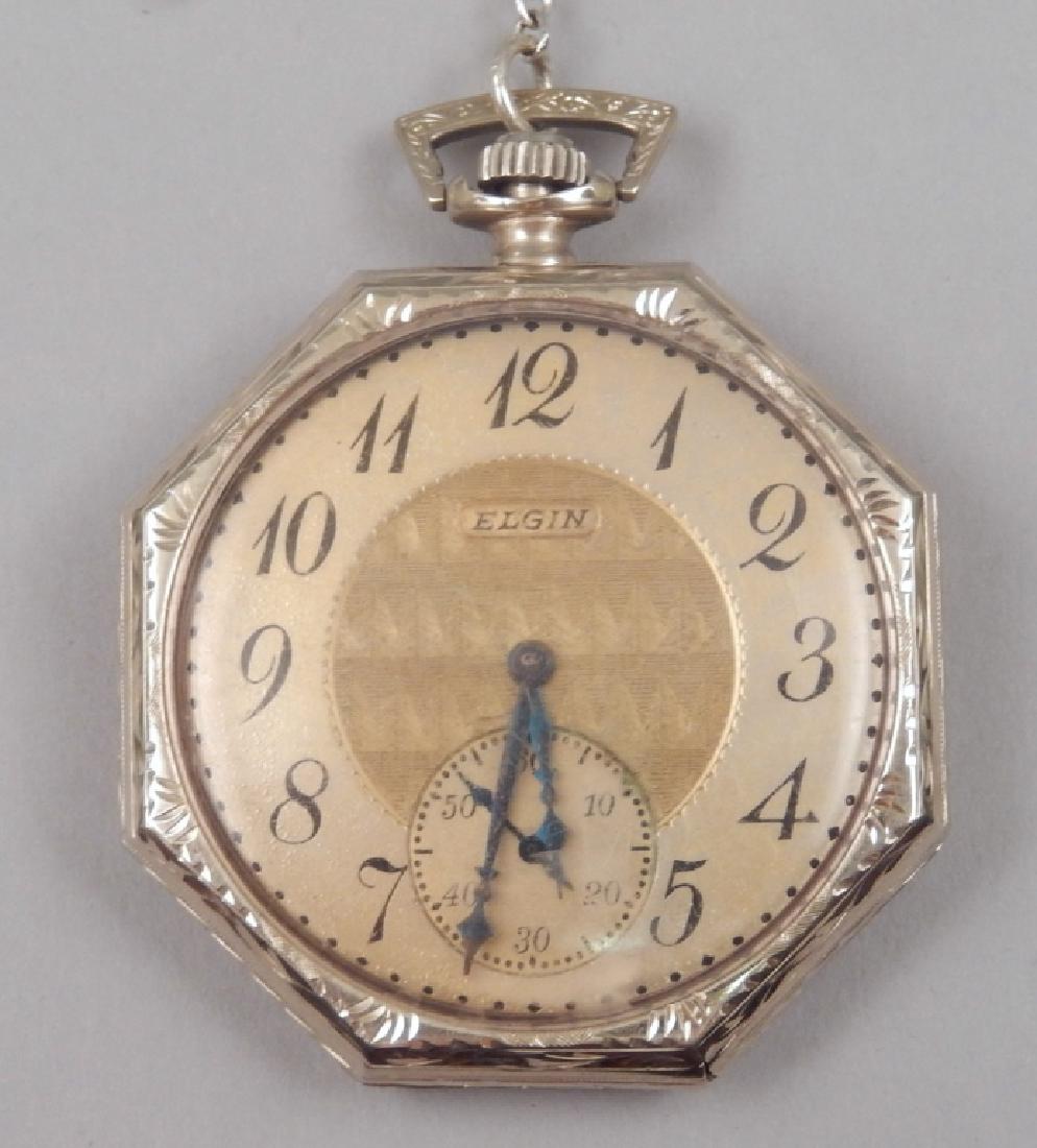 Elgin white gold pocket watch: Elgin white gold pocket watch, 14k gold eight side case, open face, 1 5/8" diameter, 15 jewel movement, case stamped Columbia Watch Case Co. 14k, 25" stamped sterling silver fancy link chain, weight 3