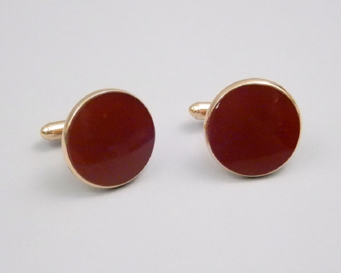 Gold carnelian cufflinks: Gold carnelian cufflinks, round in shape, 13/16" diameter, early 20th century, stamped 14k, weight 6.9 dwt complete