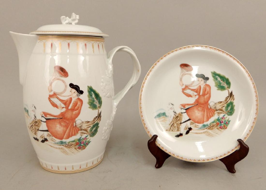 Mottahedeh Hunting Horn porcelain pitcher and plate: Mottahedeh Hunting Horn porcelain pitcher and plate, 96oz pitcher with lid, HC 233, 11" high, and a plate, HC 230, 8 1/4" diameter, both marked on bottom Mottahedeh, and marked "Historic Charleston Re