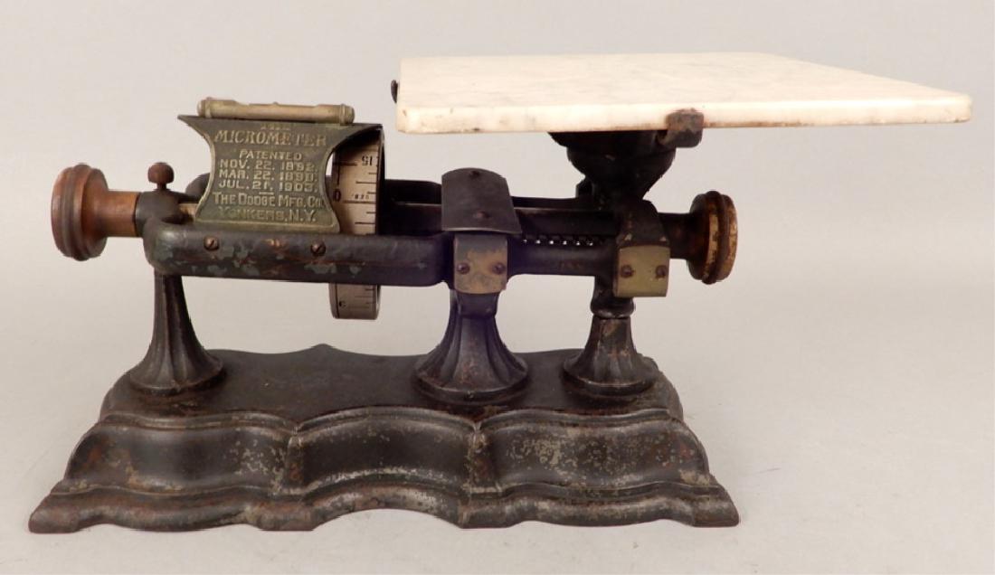 The Micrometer Scale by Dodge Mfg. Co: The Micrometer Scale by Dodge Mfg. Co., painted cast iron base, flat marble scale base, 8 3/4" x 17" x 10"