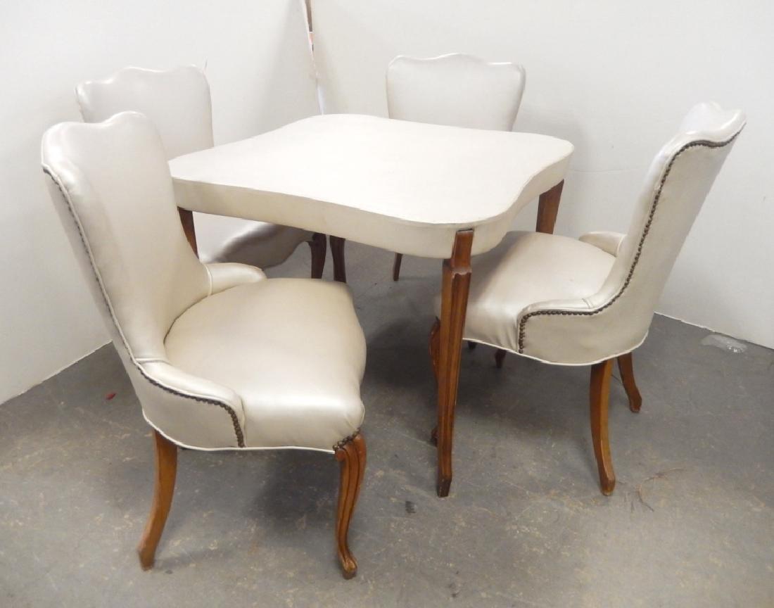 Five piece dinette set: Five piece dinette set, fruitwood and leather upholstered chairs and table, chairs with brass tack trim, table 29" x 36" square, chairs 36" high