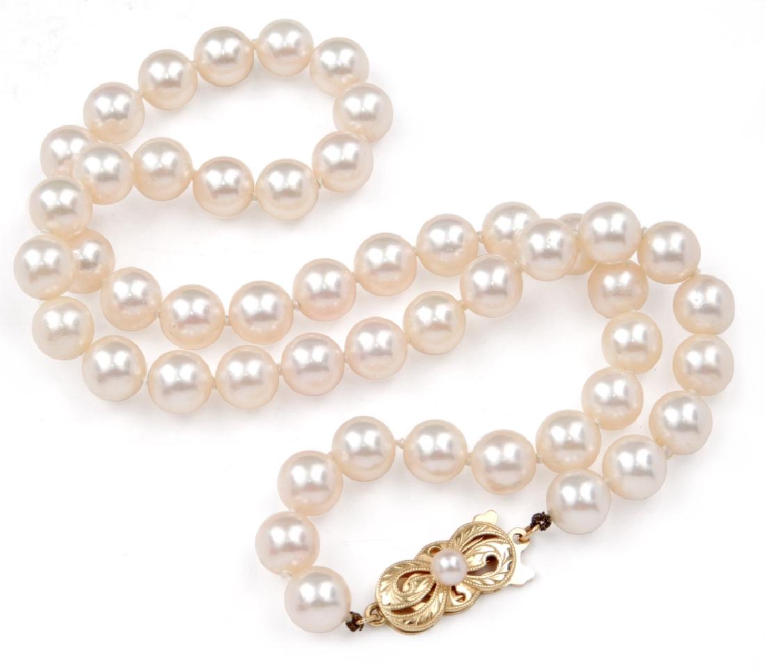 Mikimoto pearl necklace: Mikimoto pearl necklace, 16" long necklace comprised of fifty 7mm pearls, individually knotted, 18k gold engraved clasp set with one 3mm pearl, stamped 750 (18k), Mikimoto hallmark