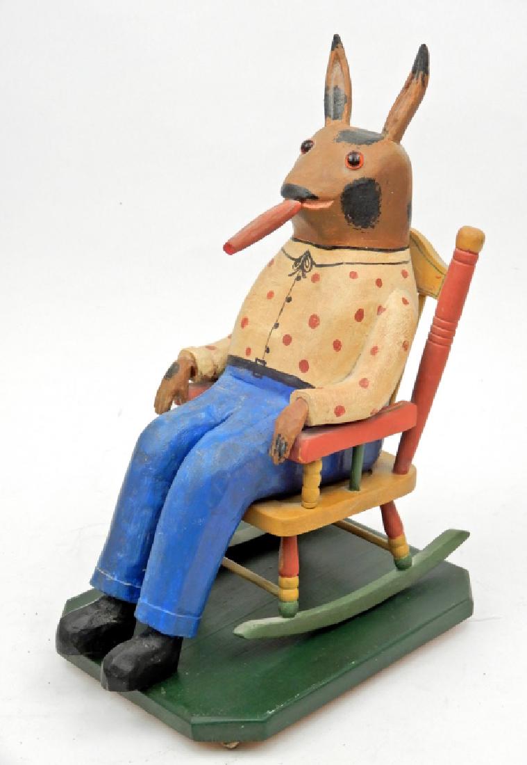Walter & June Gottshall contemporary folk art Rabbit: Walter & June Gottshall contemporary folk art Rabbit with cigar, sitting in a rocking chair smoking a cigar, carved and painted, glass eyes, signed under chair Walter & June G., signed under base June
