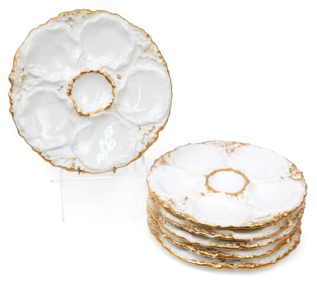 Set of six porcelain French oyster plates: Set of six porcelain French oyster plates, Charles Pillivuyt & Cie, gilt decoration, hallmarked on bottom CP & Co, also marked Ch. Pillivuyt & Cie, Paris, Exp. 1900, Grand Prix, five wells, 9 1/4" dia