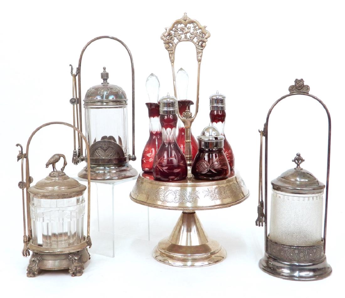 Three pickle castors and castor set: Three pickle castors and castor set, includes Meriden Silver Plate Co. pickle castor, monogrammed ECP, numbered 699, 10 1/2" high, Pairpoint Mfg. Co., quadruple plate pickle castor, numbered 606, 12 1