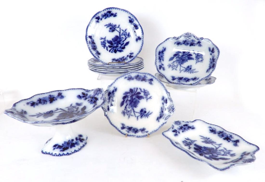Davenport flow blue Pekin pattern pieces: Davenport flow blue Pekin pattern pieces, eleven pieces total, includes footed centerpiece, 6 1/4" x 11 3/4", six plates, 9", two single handled plates, 9 7/8", oval handled plate, 10 1/2", and one re
