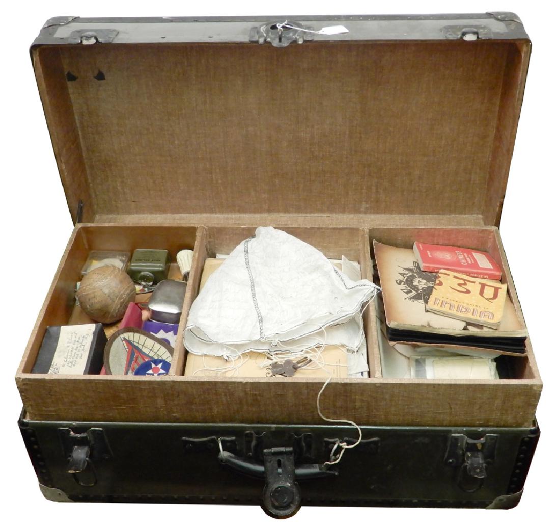 WWII Footlocker containing personal effects of Clarence: WWII footlocker containing personal effects of Clarence Gilmore, Army Air Force, served in the India China Division, including paystubs, pictures, letters, patches, ribbons, document from the commandi