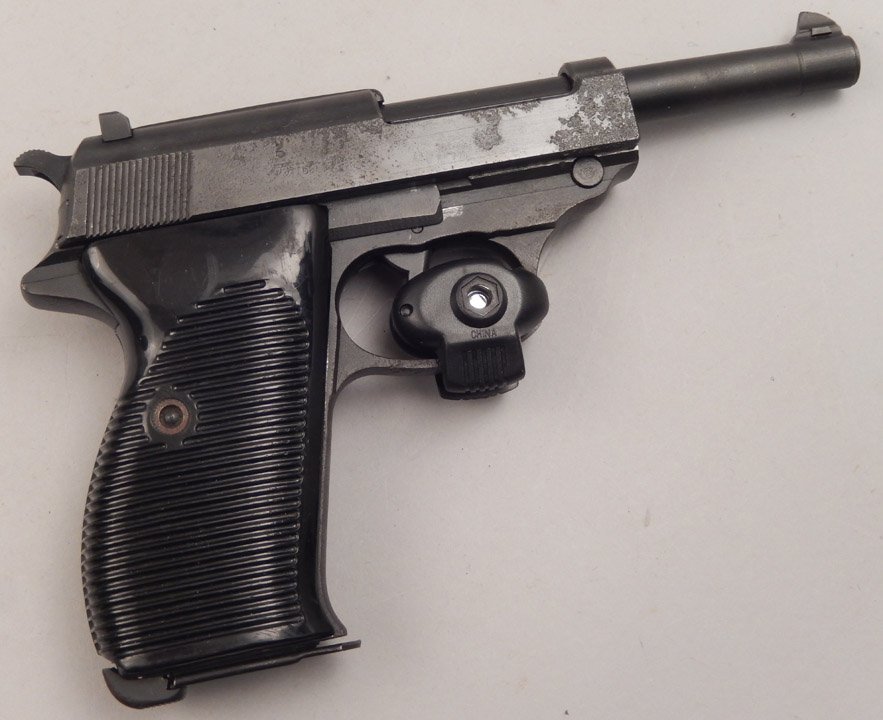 Mauser Luger semi-automatic P-38 pistol: Mauser Luger semi-automatic P-38 pistol, open hammer, 9MM, 8 shot, model P-38, magazine feed, dated 45 (1945), serial number 1955F, marked SVW/45, eagle and swastika, matching numbers slide and frame,