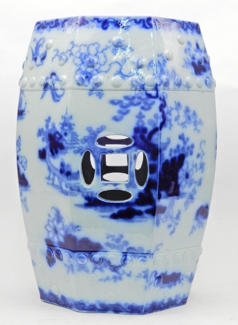 Flow blue earthenware garden seat: Flow blue earthenware garden seat, barrel form, pierced sides, 18 1/2" high x 12" diameter